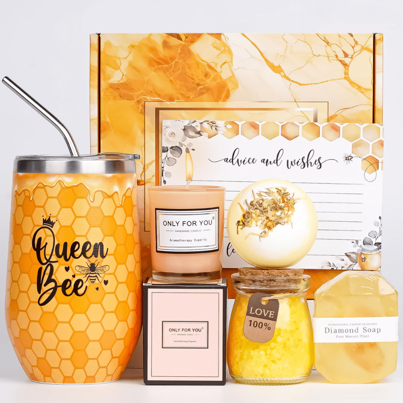 Queen Bee gift set featuring tumbler, candles, soap, and decorative items on a white background — luxurious wellness and self-care bundle by Joreen Brands, inspired by natural honey and bees.