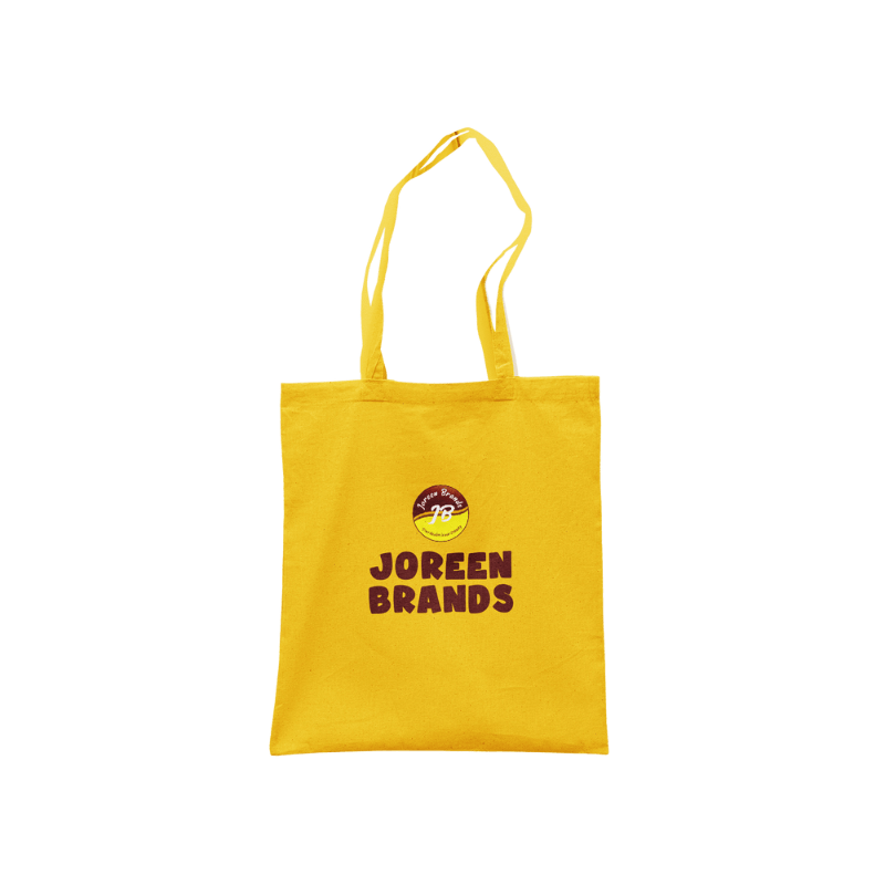 Yellow tote bag with Joreen Brands logo on a white background — bright, reusable eco-friendly bag promoting sustainability and the natural essence of African honey and superfoods.